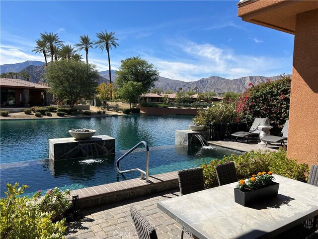 50135 Camino Privado Ln, Quinta, CA 92253 - view of swimming pool with a mountain view