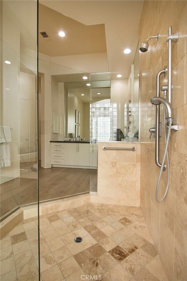 50135 Camino Privado Ln, Quinta, CA 92253 - bathroom featuring a walk in shower, vanity, and recessed lighting