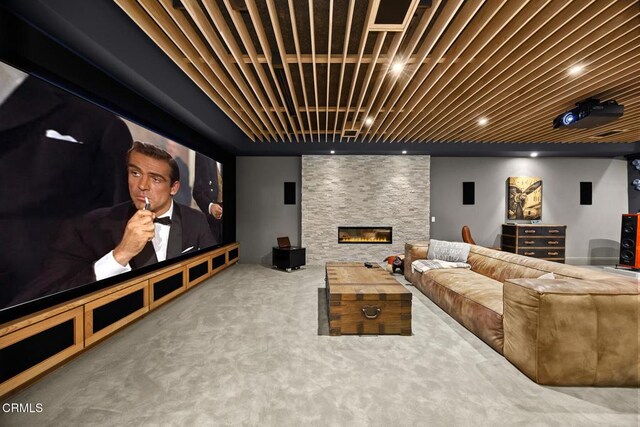 2060 Windover Rd, Pasadena, CA 91107 - carpeted home theater with a stone fireplace