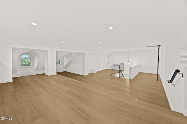 2060 Windover Rd, Pasadena, CA 91107 - below grade area with light wood finished floors, recessed lighting, and baseboards