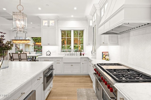 2060 Windover Rd, Pasadena, CA 91107 - kitchen featuring custom exhaust hood, stainless steel appliances, a sink, light countertops, and recessed lighting