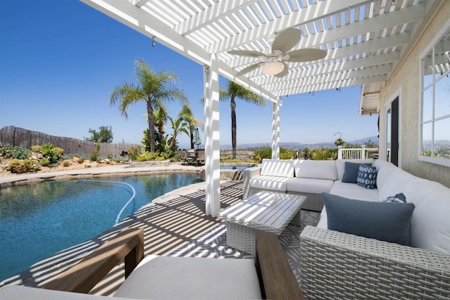 29730 Red Mountain Rd, Valley Center, CA 92082 - fenced backyard featuring outdoor lounge area, a pergola, a ceiling fan, and a mountain view