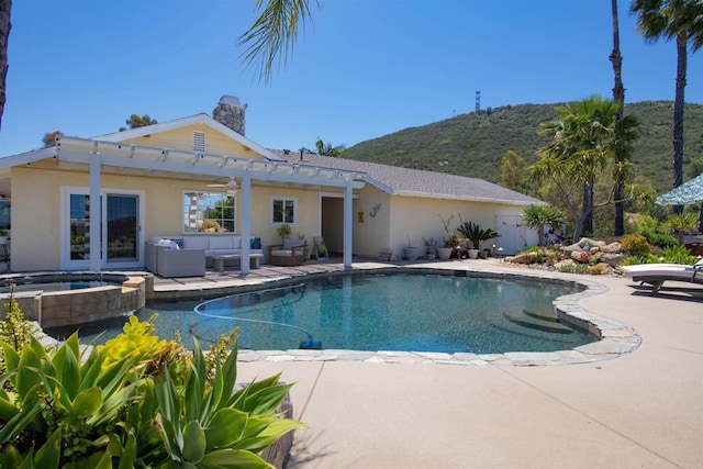 29730 Red Mountain Rd, Valley Center, CA 92082 - view of swimming pool with a pergola, an outdoor living space, a mountain view, a patio area, and a pool with connected hot tub