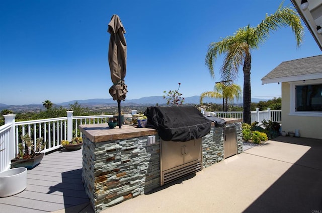 29730 Red Mountain Rd, Valley Center, CA 92082 - view of patio featuring exterior kitchen, a mountain view, and an outdoor bar