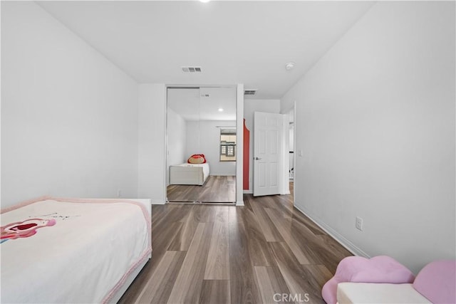 16007 Dexter St, Chino, CA 91708 - bedroom featuring wood finished floors and baseboards