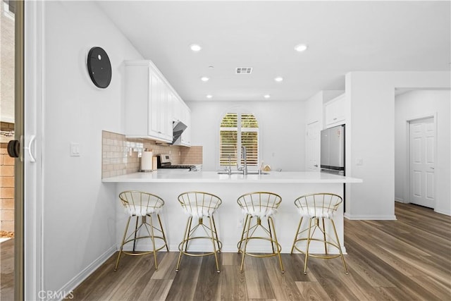 16007 Dexter St, Chino, CA 91708 - kitchen with a sink, a peninsula, appliances with stainless steel finishes, dark wood-type flooring, and recessed lighting