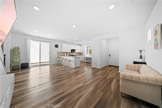 16007 Dexter St, Chino, CA 91708 - living room with recessed lighting and dark wood-style flooring