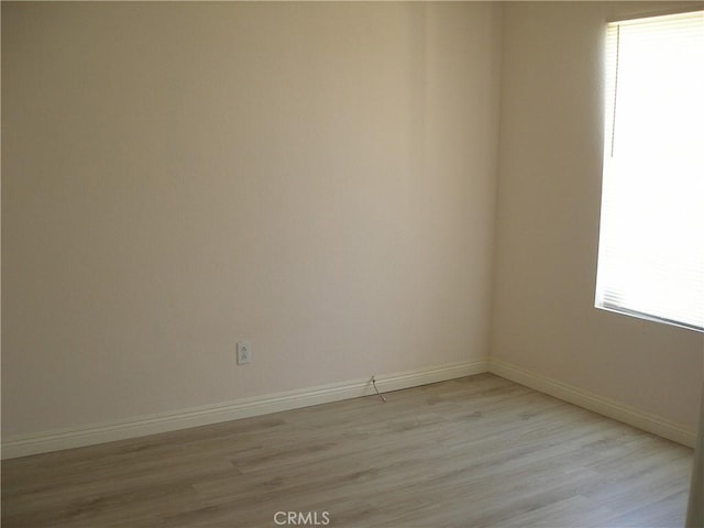 12975 Stanford Dr, Victorville, CA 92392 - spare room with light wood-type flooring and baseboards