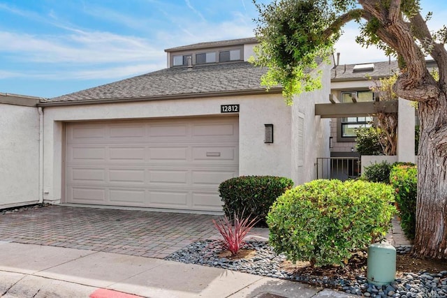 12812 Caminito En Flor, Del Mar, CA 92014 - view of front of property featuring decorative driveway, stucco siding, and an attached garage