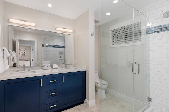 12812 Caminito En Flor, Del Mar, CA 92014 - bathroom featuring a stall shower, toilet, double vanity, recessed lighting, and tile patterned flooring