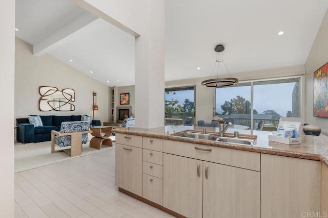 12812 Caminito En Flor, Del Mar, CA 92014 - kitchen with a sink, light brown cabinetry, light stone counters, open floor plan, and recessed lighting