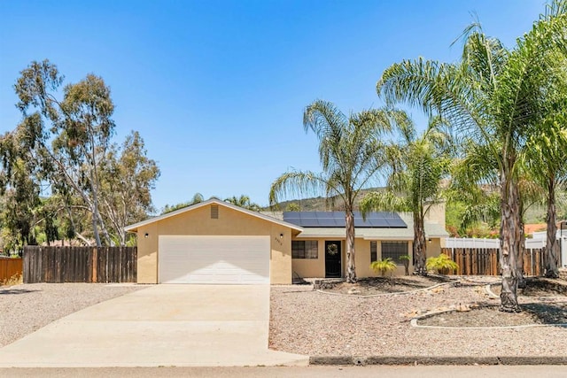 23912 Benito Way, Ramona, CA 92065 - single story home featuring stucco siding, concrete driveway, an attached garage, and roof mounted solar panels