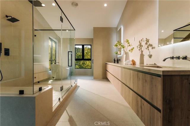 2608 Zorada Dr, Los Angeles, CA 90046 - full bath with a stall shower, double vanity, and recessed lighting