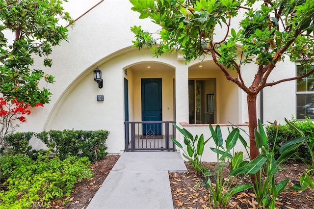 108 Coastal Gdn, Irvine, CA 92618 - view of exterior entry featuring stucco siding