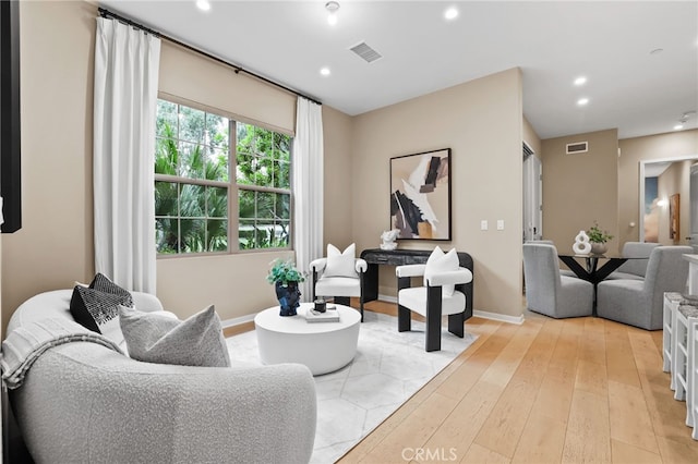 108 Coastal Gdn, Irvine, CA 92618 - living room featuring recessed lighting, light wood finished floors, and baseboards
