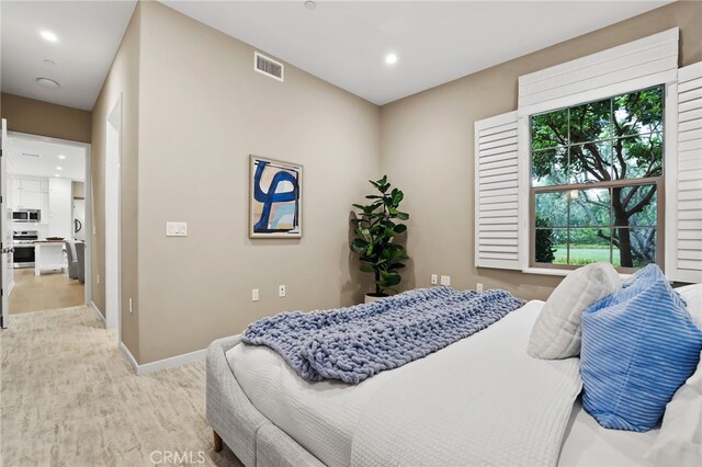 108 Coastal Gdn, Irvine, CA 92618 - bedroom featuring wood finished floors, recessed lighting, and baseboards