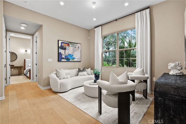 108 Coastal Gdn, Irvine, CA 92618 - living room featuring wood finished floors, recessed lighting, and baseboards