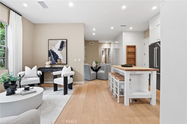 108 Coastal Gdn, Irvine, CA 92618 - living room featuring light wood-style flooring, recessed lighting, and baseboards