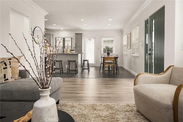 5893 E Adderley Dr, Long Beach, CA 90808 - living room with ornamental molding, wood finished floors, recessed lighting, and baseboards