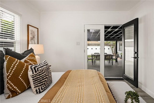 5893 E Adderley Dr, Long Beach, CA 90808 - bedroom featuring multiple windows, access to outside, crown molding, wood finished floors, and baseboards