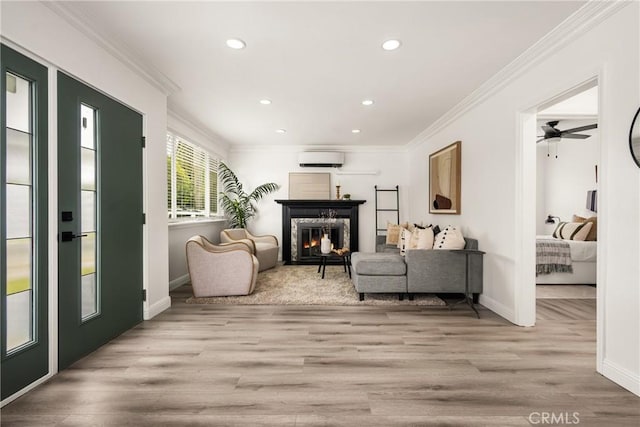 5893 E Adderley Dr, Long Beach, CA 90808 - living room with recessed lighting, wood finished floors, baseboards, a premium fireplace, and ornamental molding