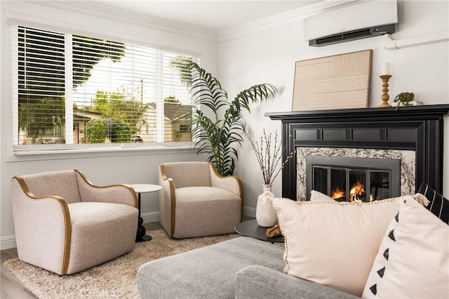 5893 E Adderley Dr, Long Beach, CA 90808 - sitting room with a wall unit AC, baseboards, a premium fireplace, ornamental molding, and wood finished floors