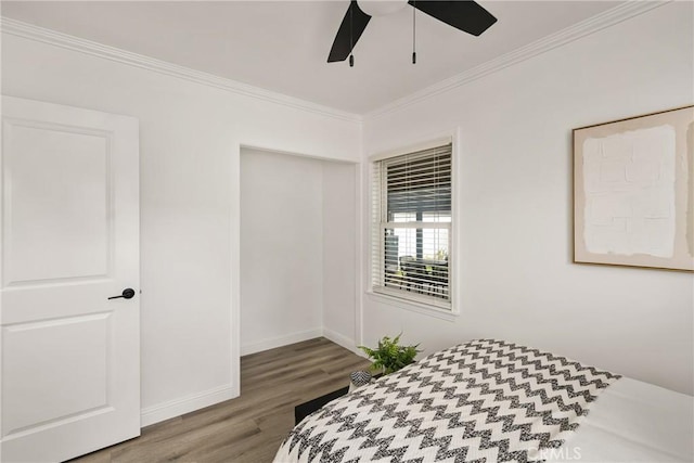 5893 E Adderley Dr, Long Beach, CA 90808 - bedroom featuring crown molding, wood finished floors, baseboards, and ceiling fan