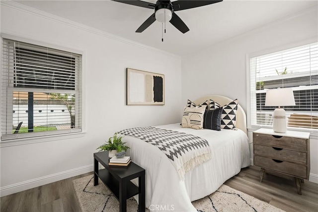 5893 E Adderley Dr, Long Beach, CA 90808 - bedroom with wood finished floors, ornamental molding, baseboards, and ceiling fan