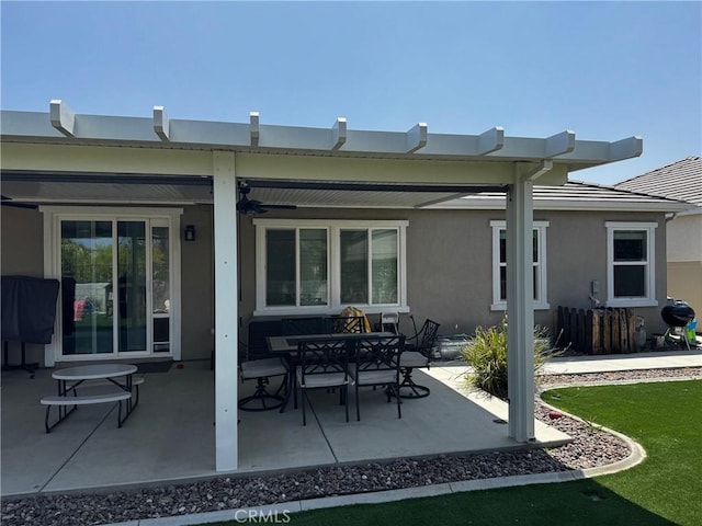 31827 Ives Ct, Menifee, CA 92584 - rear view of property with stucco siding, a patio, and a ceiling fan