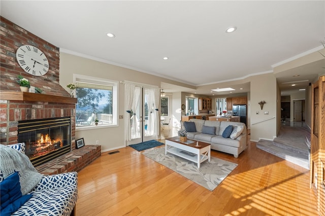 1357 Sunny Heights Rd, Fallbrook, CA 92028 - living room featuring a brick fireplace, light wood-style floors, baseboards, crown molding, and recessed lighting
