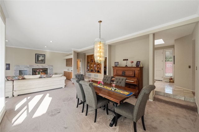 1357 Sunny Heights Rd, Fallbrook, CA 92028 - dining area with light carpet, crown molding, a chandelier, recessed lighting, and a high end fireplace
