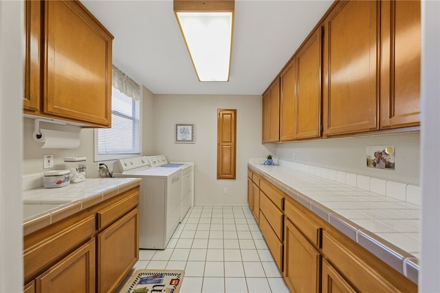 1357 Sunny Heights Rd, Fallbrook, CA 92028 - laundry area featuring cabinet space, independent washer and dryer, and light tile patterned floors