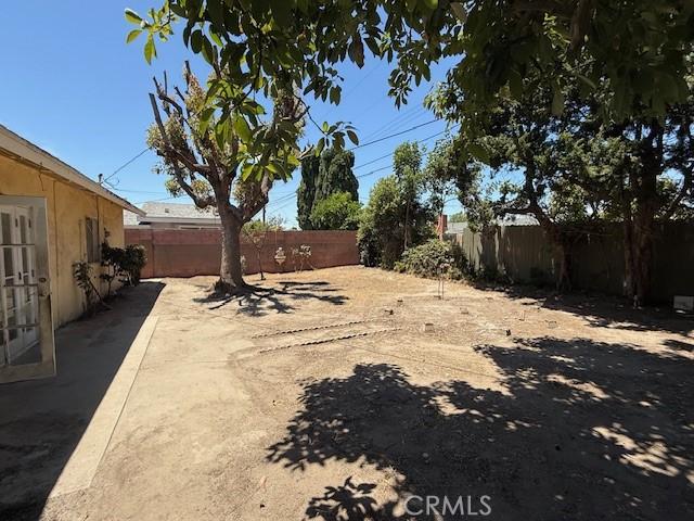 10111 Dewey Dr, Garden Grove, CA 92840 - fenced backyard with a patio area