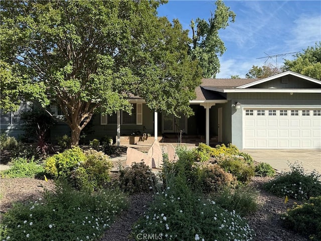 117 S Park Dr, Madera, CA 93637 - view of front of home featuring an attached garage and driveway