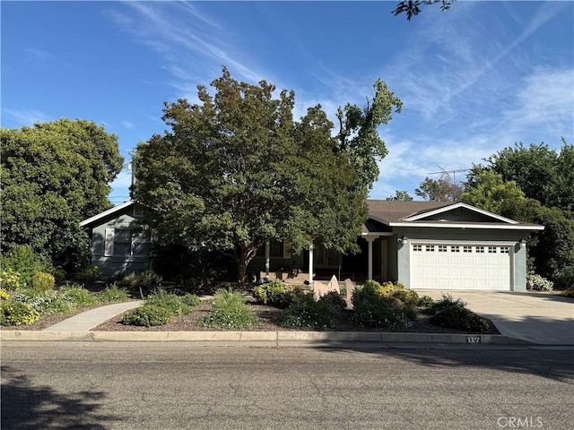 117 S Park Dr, Madera, CA 93637 - view of front of home with a garage and driveway