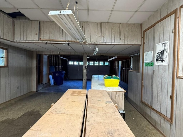 117 S Park Dr, Madera, CA 93637 - miscellaneous room with a drop ceiling and wooden walls