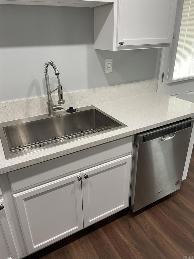 141921 Flo Dr, Alpine, CA 91901 - kitchen featuring stainless steel dishwasher, a sink, white cabinetry, dark wood-style floors, and light stone counters