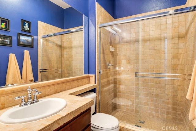 36235 Bay Hill Dr, Beaumont, CA 92223 - full bathroom with toilet, a shower stall, and vanity