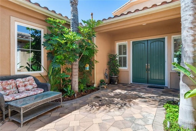 36235 Bay Hill Dr, Beaumont, CA 92223 - entrance to property featuring a patio area and stucco siding