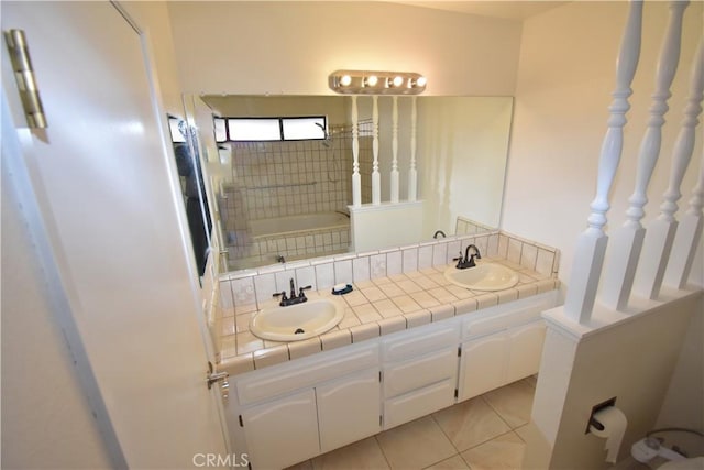 14279 Galleon Ln, Helendale, CA 92342 - bathroom with double vanity, tile patterned flooring, and a bathtub