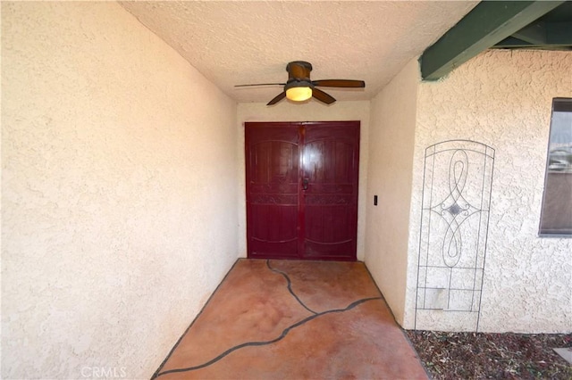 14279 Galleon Ln, Helendale, CA 92342 - view of exterior entry with ceiling fan and stucco siding