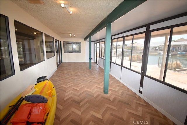 14279 Galleon Ln, Helendale, CA 92342 - hall featuring a water view and a textured ceiling