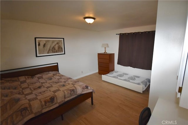 14279 Galleon Ln, Helendale, CA 92342 - bedroom featuring wood finished floors and baseboards