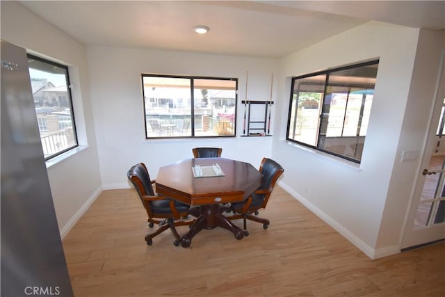 14279 Galleon Ln, Helendale, CA 92342 - dining space featuring baseboards, light wood-style floors, and recessed lighting
