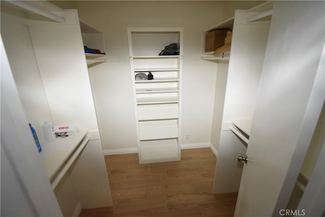 14279 Galleon Ln, Helendale, CA 92342 - spacious closet featuring light wood finished floors