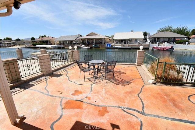 14279 Galleon Ln, Helendale, CA 92342 - view of patio with a water view, a residential view, and outdoor dining space