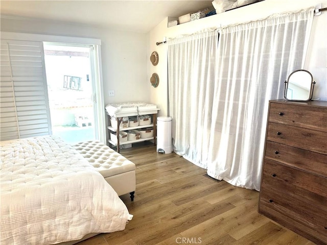 140 W Pioneer Ave Unit 52, Redlands, CA 92374 - bedroom with wood finished floors