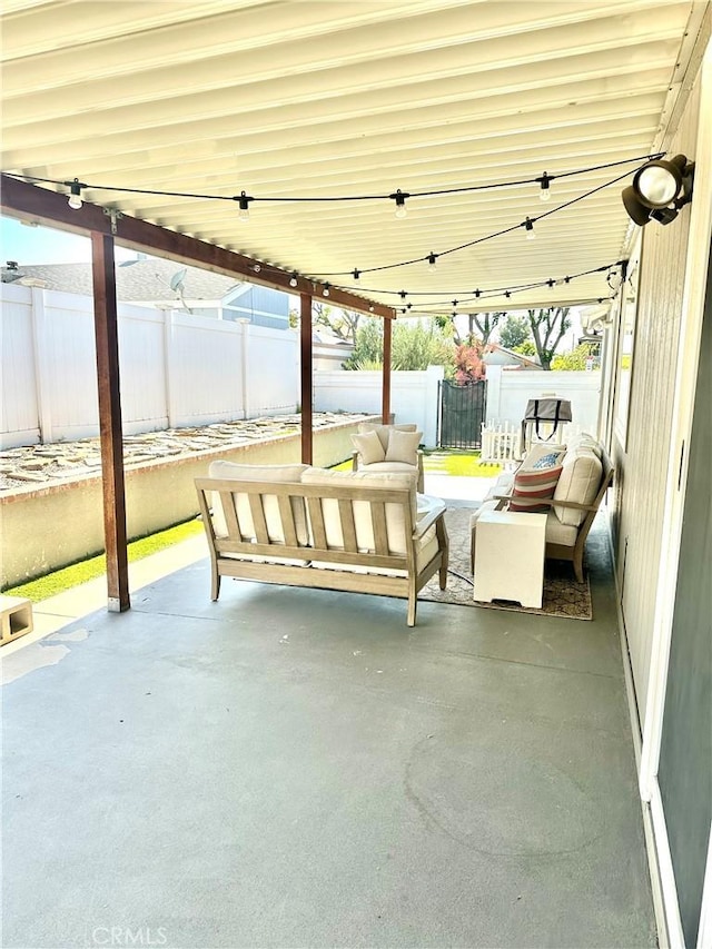 140 W Pioneer Ave Unit 52, Redlands, CA 92374 - fenced backyard featuring a patio and an outdoor hangout area