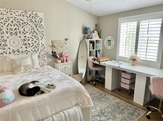 140 W Pioneer Ave Unit 52, Redlands, CA 92374 - bedroom with wood finished floors and an office area
