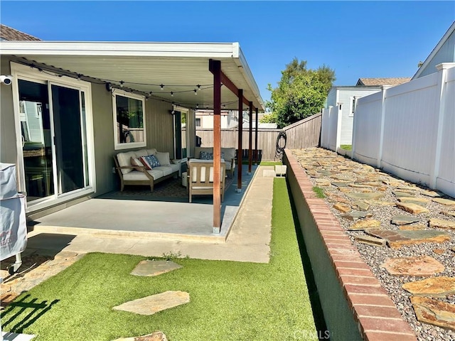 140 W Pioneer Ave Unit 52, Redlands, CA 92374 - fenced backyard featuring a patio area and an outdoor hangout area